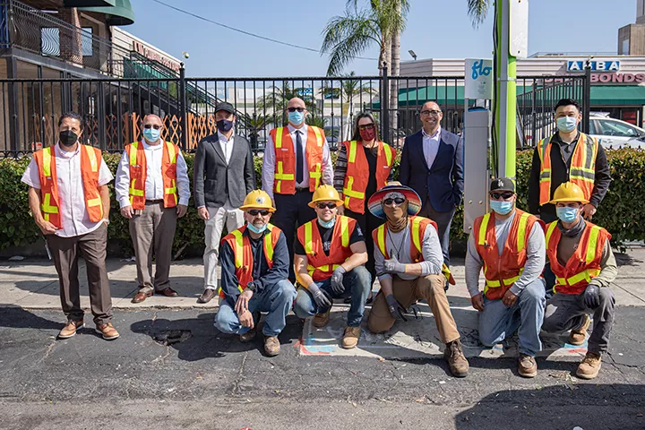 Group photo of the Bureau of Street Lighting at the EV charger installation 