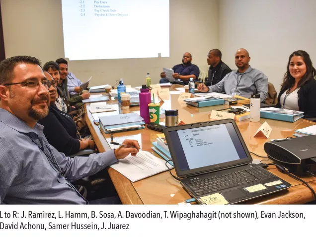 Employees in meeting room