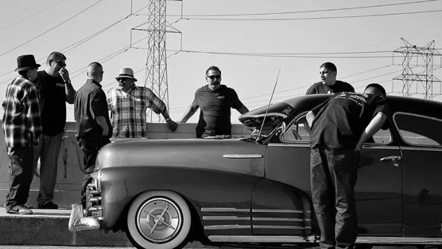 Group of men with classic car